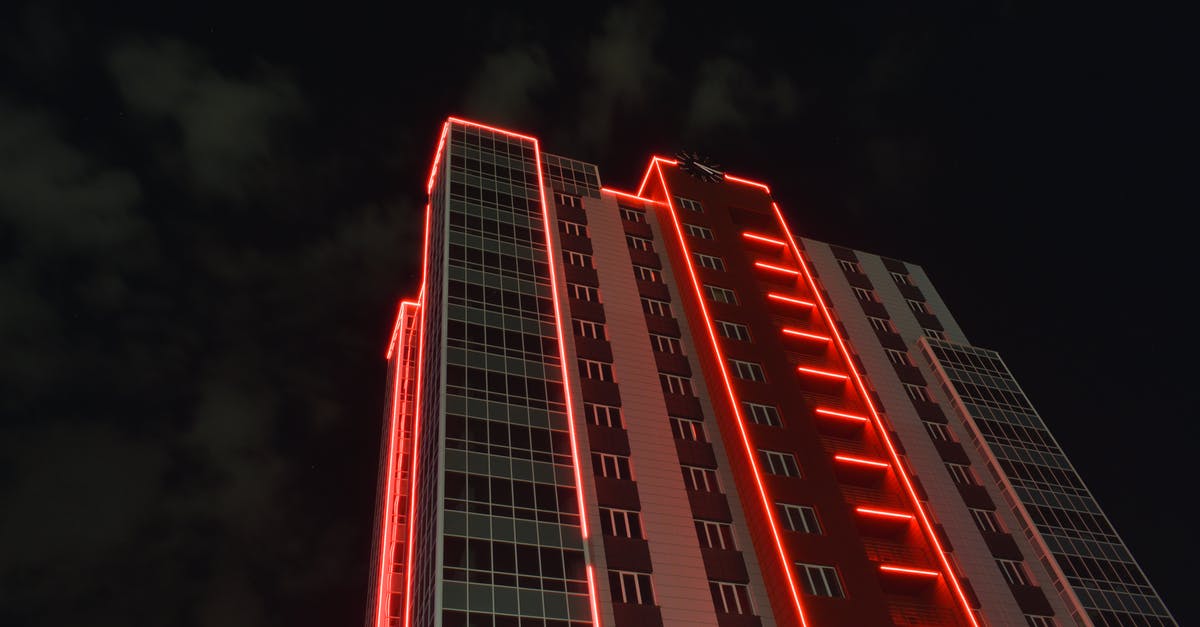 What is the red light in the hotel bath for? - Low Angle Photography of Building