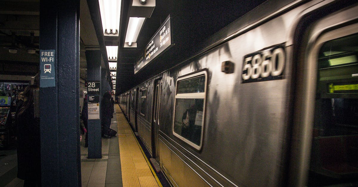 What is the state of train travel in USA? - Black and Silver Train in Train Station