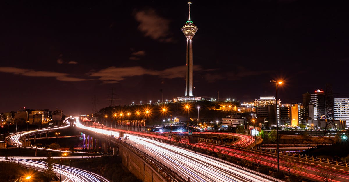 What is this arch-and-tower near a road? - A Time Lapse Photography of City Lights at Night