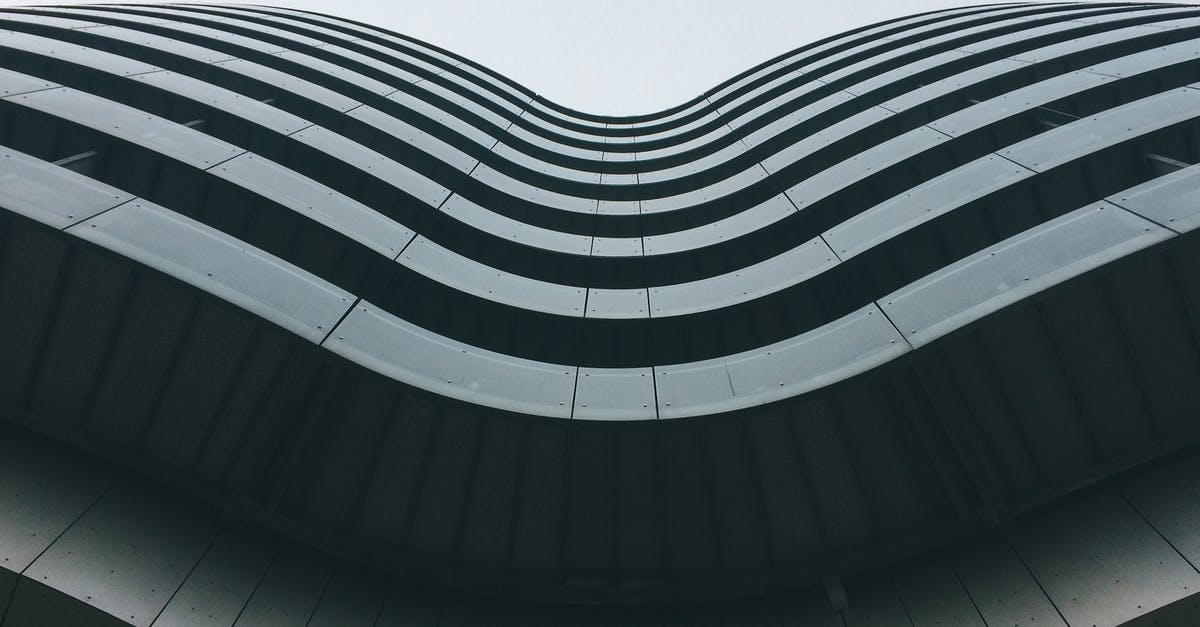 What is this building? - Low Angle Photography of High Rise Building