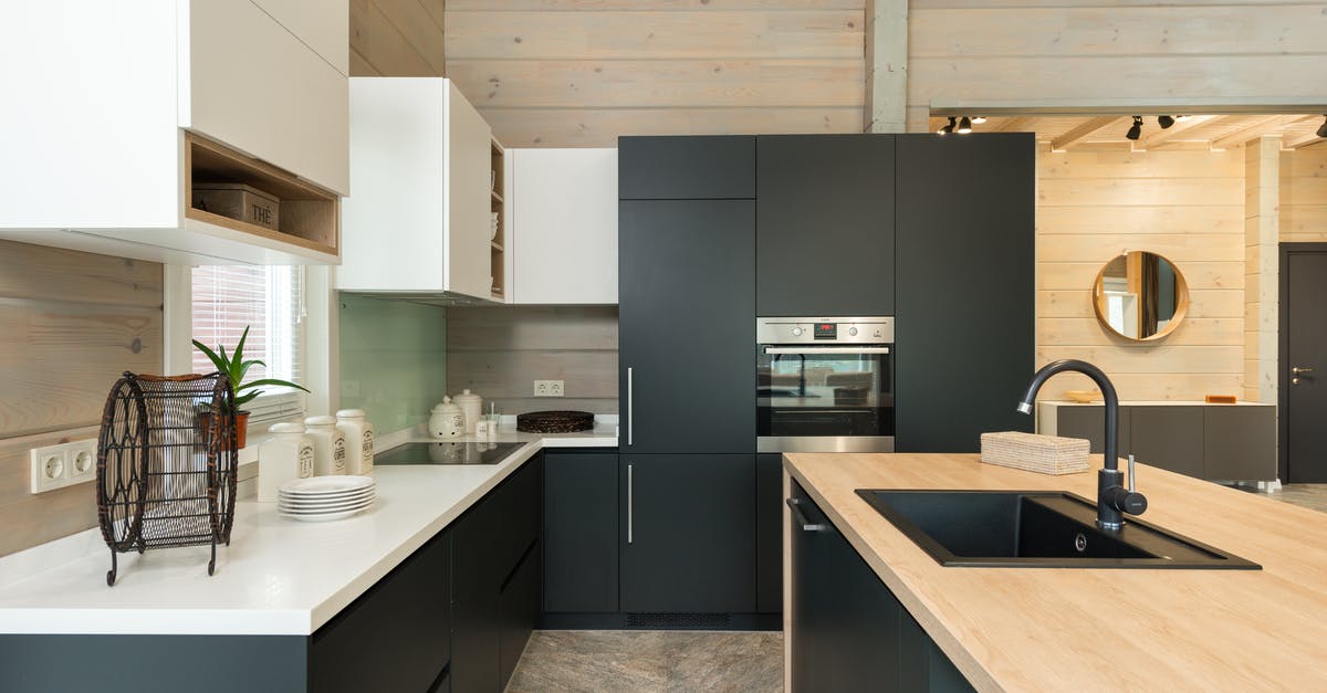 What is this distinct ceramics style and where it is made? - Modern kitchen with matte cupboards and built in appliances