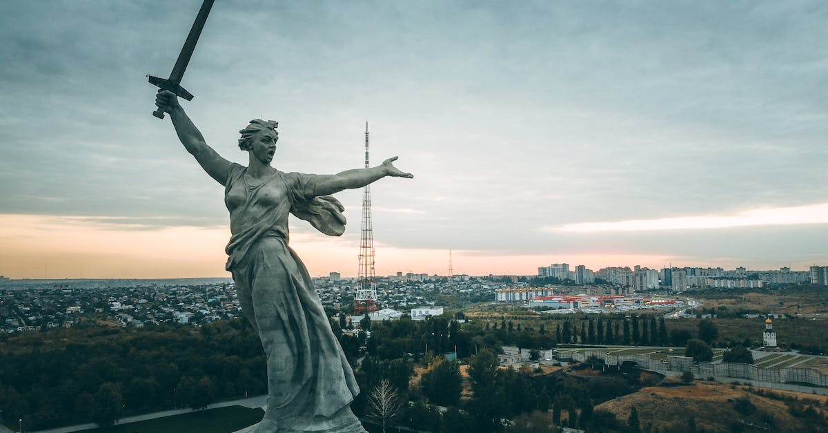 What is this monument in Tallinn called? - Drone Shot of The Motherland Calls during Sunrise