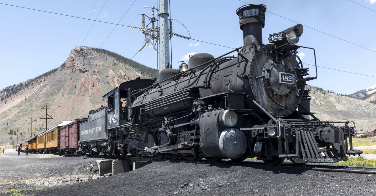 What is this mountain next to the Semmering railway called? - Freight Train during Day