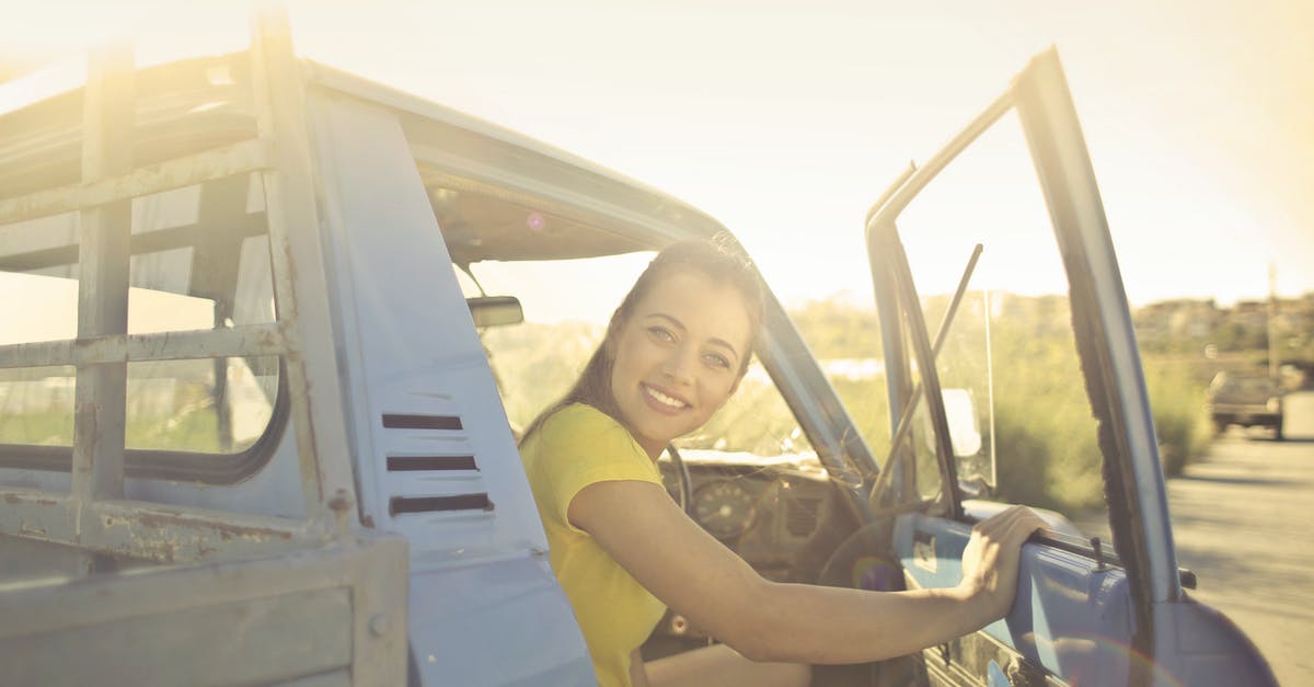 What is Two-Way Open Jaw? - Woman Peeking Inside the Pickup Truck