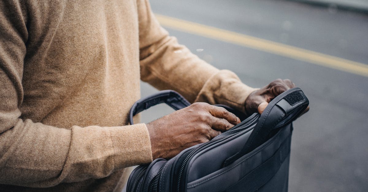 What is Two-Way Open Jaw? - Crop black man with briefcase