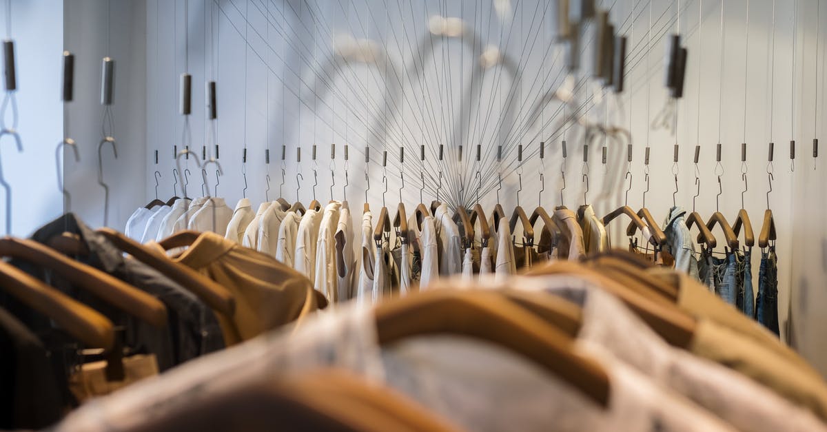 What items can be taken to Australia - Brown and Black Clothes Hanged on Clothes Hanger