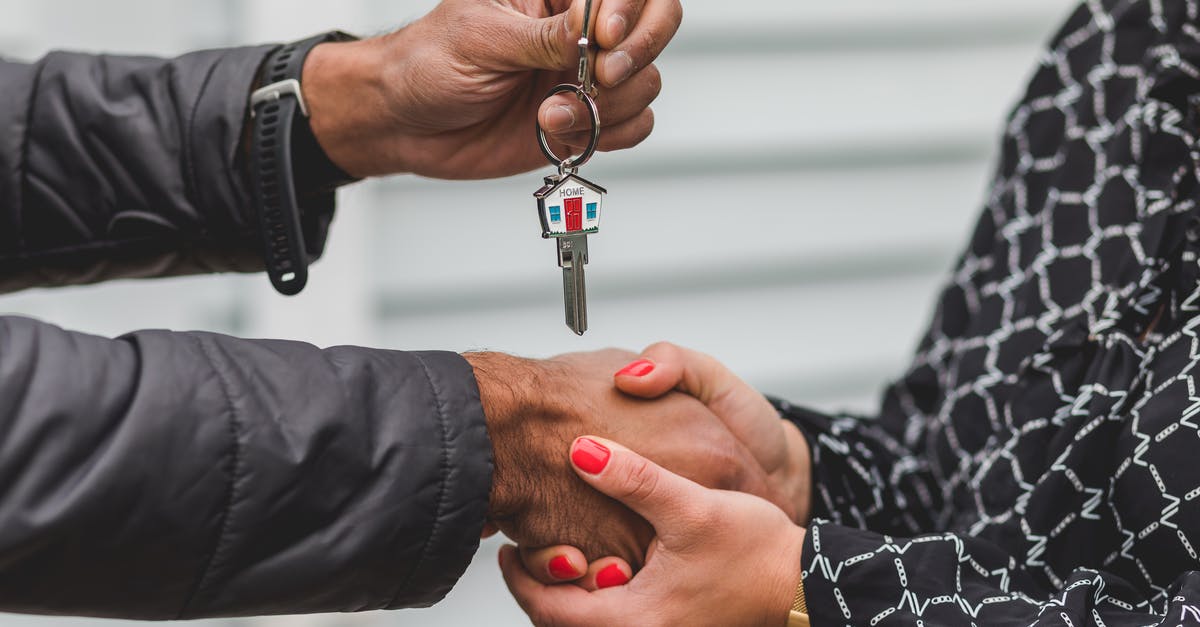 What key sights to see in one week in France? [closed] - Person Holding Silver Key