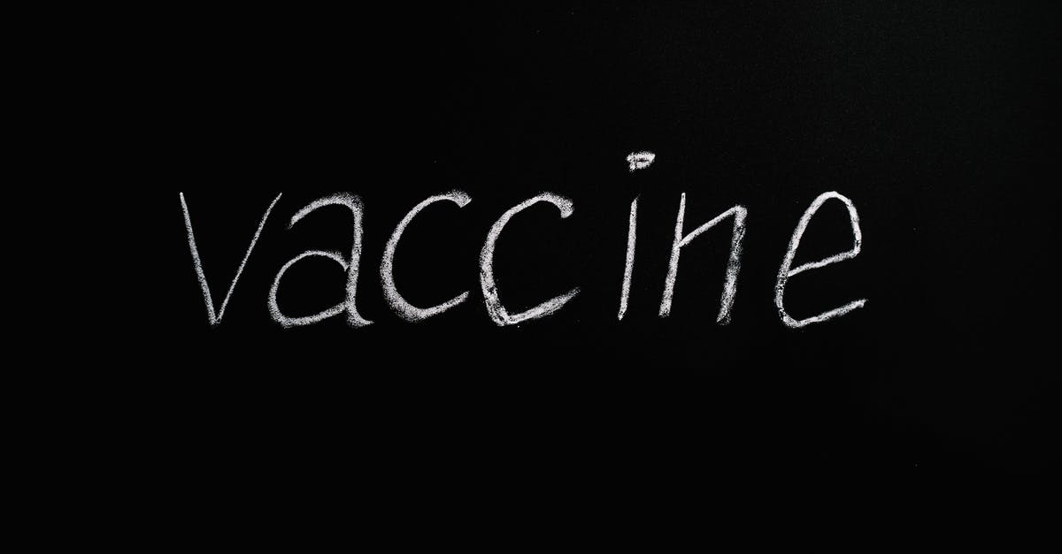 What makes vaccinations "recommended"? (for Philippines) - Vaccine Lettering Text on Black Background