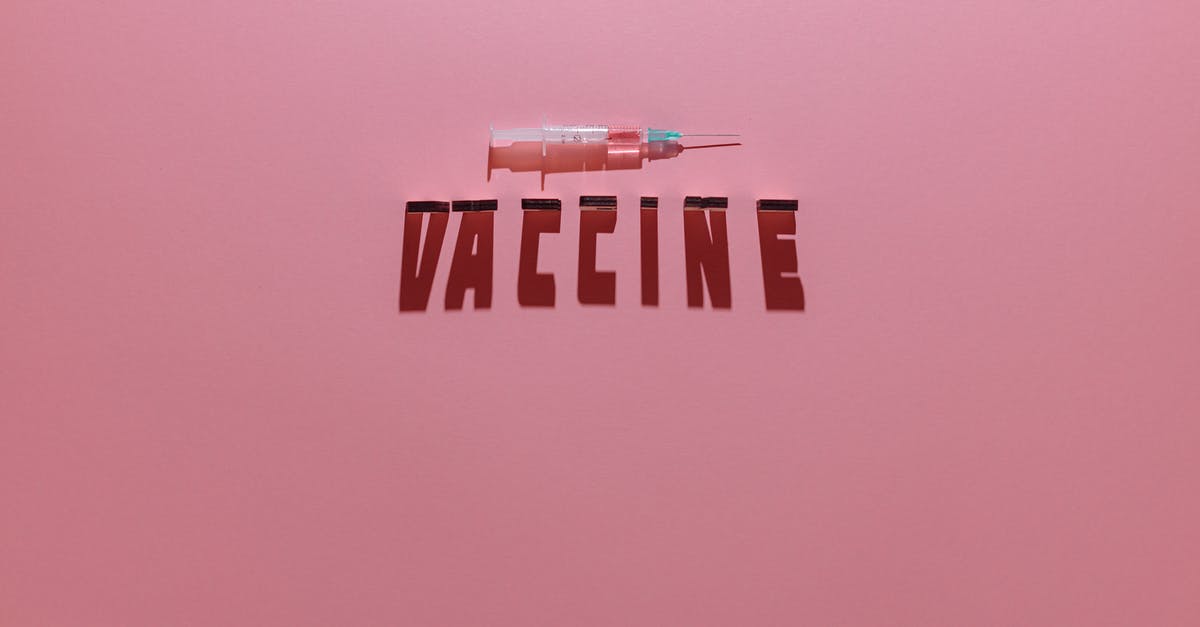 What makes vaccinations "recommended"? (for Philippines) - A Syringe and Vaccine Lettering Text on Pink Background