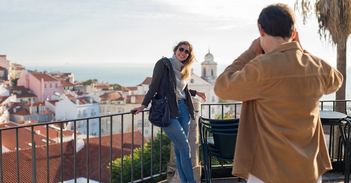 What precautions should travelers take in Spain/France? - A Woman Posing at the Camera