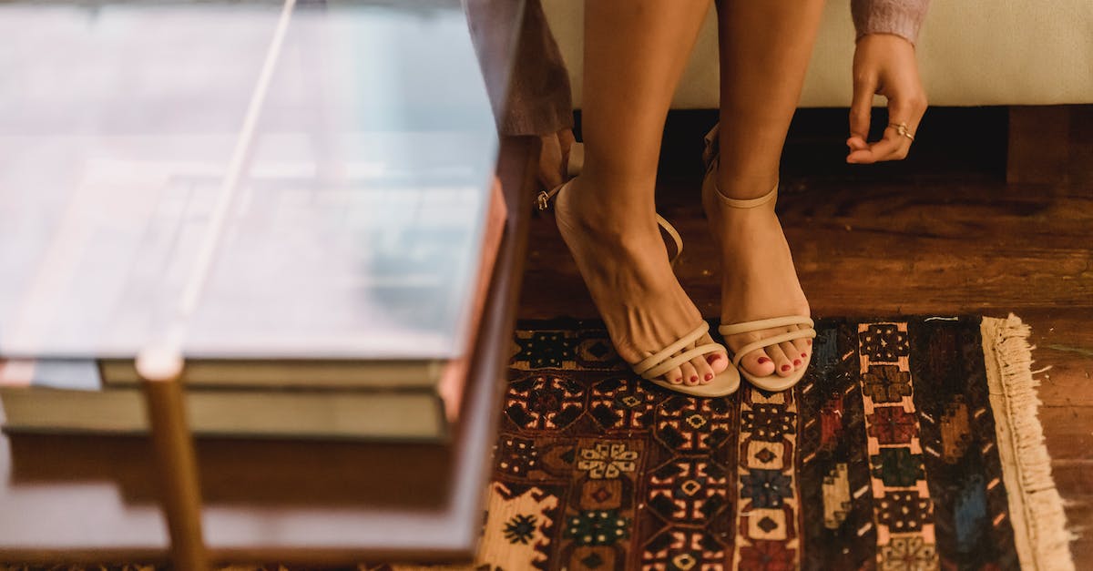 What shoes required for simple trekking in Georgia? - Woman in sandals on heels in lounge with rug