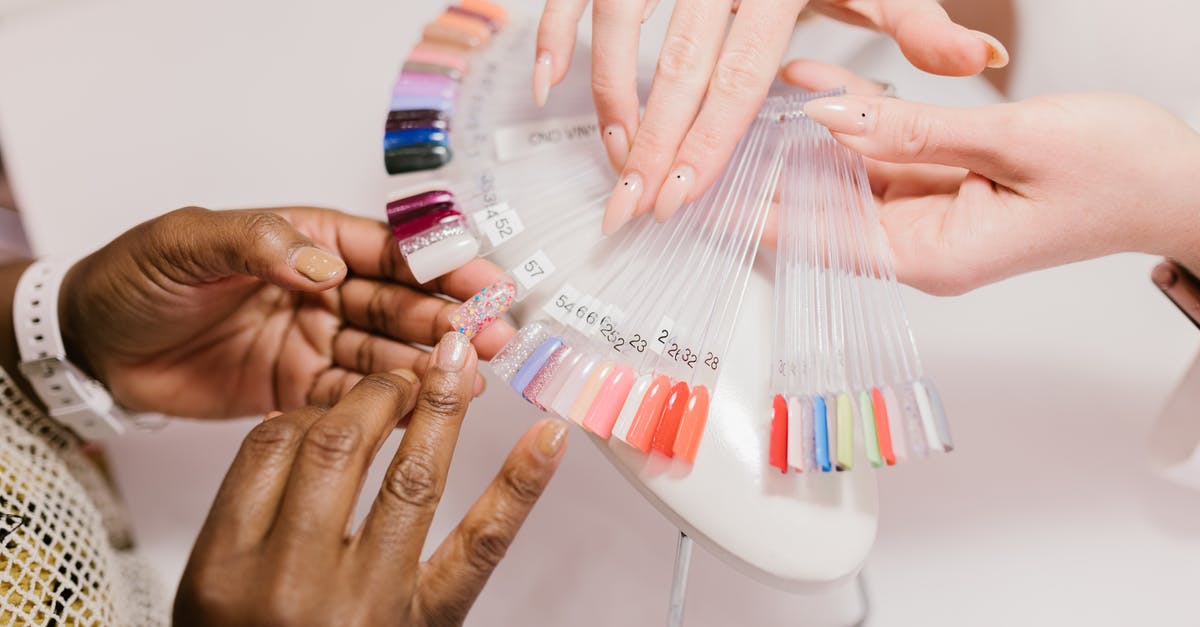 What should I consider before choosing a Sub-Aqua Certification Organisation? [closed] - A Client Choosing on a Nail Color Palette