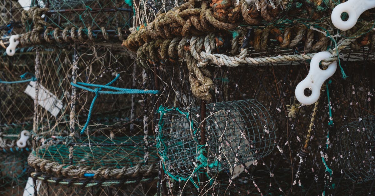 What’s different when airbnb'ing in a boat? - Cylindrical fishing nets storage at pier