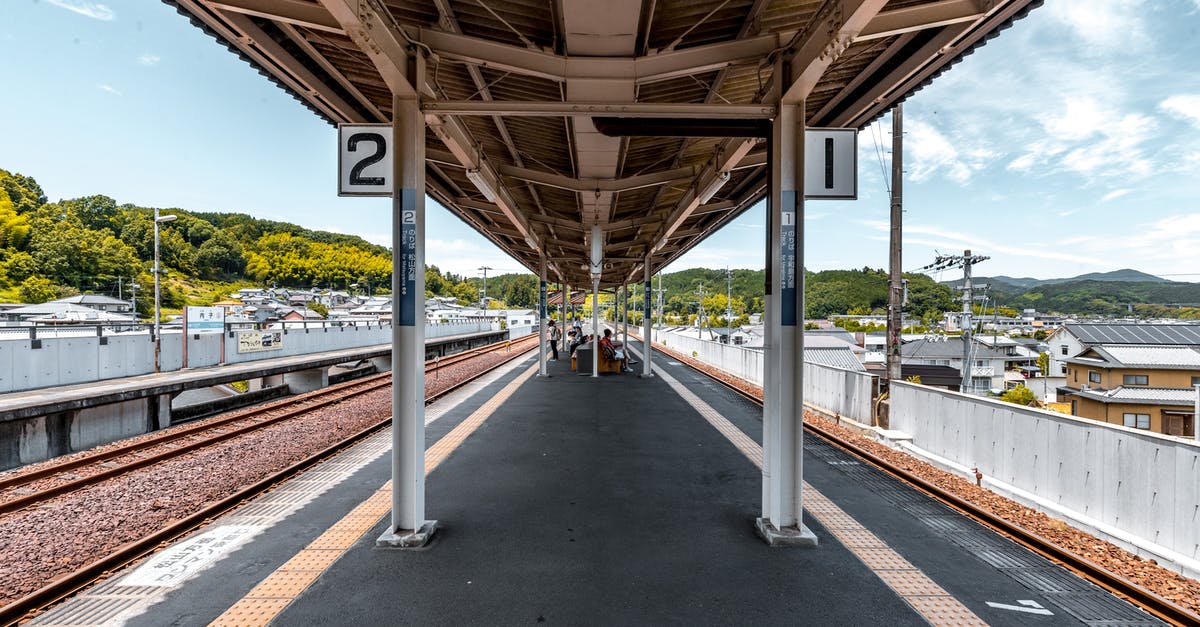 When are stopovers permitted on Japan Railways (JR) trains? - Gray Concrete Bridge