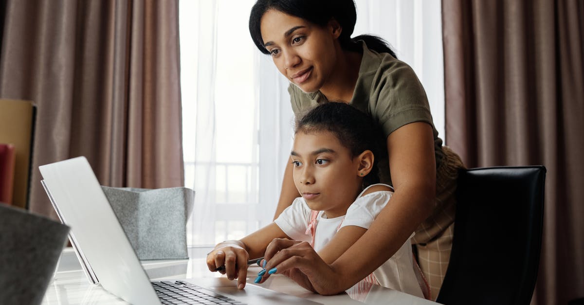 When can my mother reenter the USA after a 5-month stay? - Mother Helping her Daughter use a Laptop