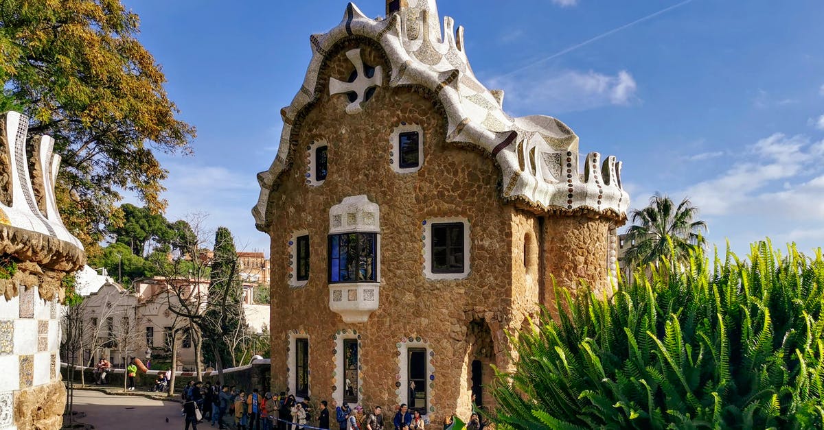 When did Barcelona's Park Güell needed tickets ? - Tourists Visiting the Casa del Guarda Gatehouse in Barcelona Spain