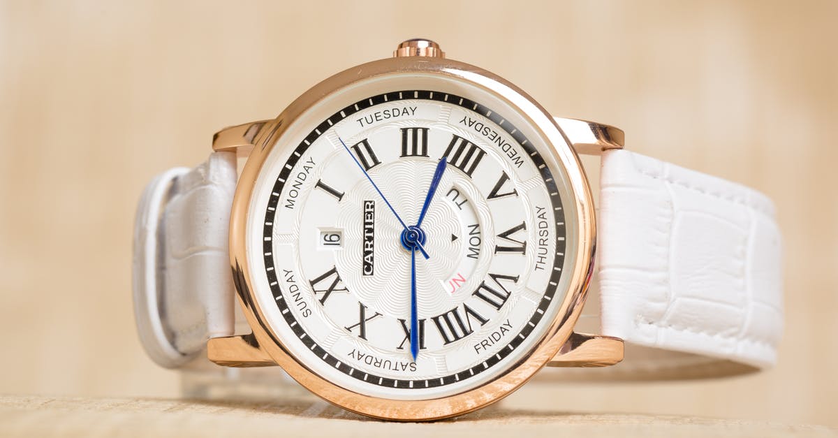 When is 1st of February 24:00 (EST) time in GMT time in the UK? [closed] - White and Gold Analog Watch