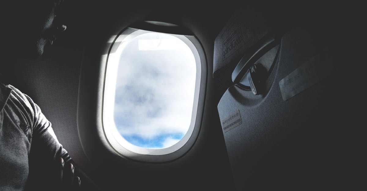 When is it that you can't reserve a specific seat on a plane beforehand? - Airplane Window Opened