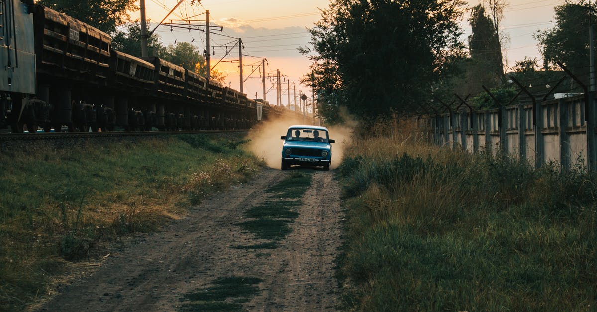 When should one travel by car instead of train when traveling France? - Blue Car on Road When should one travel by car instead of train when traveling France? - Blue Car on Road