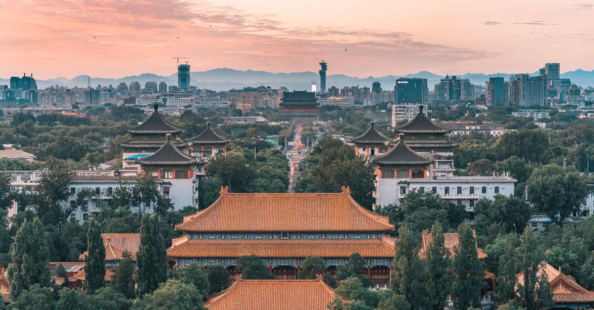 When transiting Beijing (PEK), citizens of which countries need visas? - Brown and White Concrete House