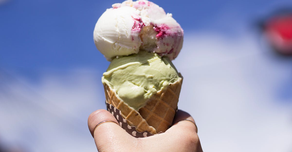 Where are good places to get gelato in Rome? [closed] - Person Holding Ice Cream With Cone