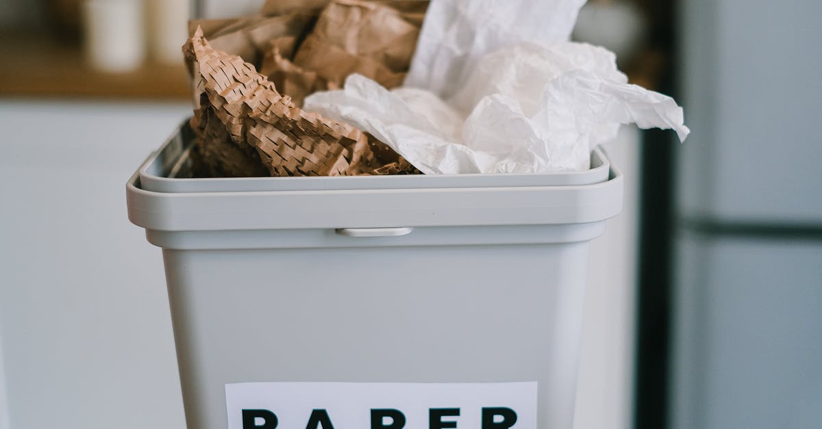 Where are open air railway carriages used in scheduled services? [closed] - Closeup of plastic container full of paper placed on blurred background of kitchen in daytime