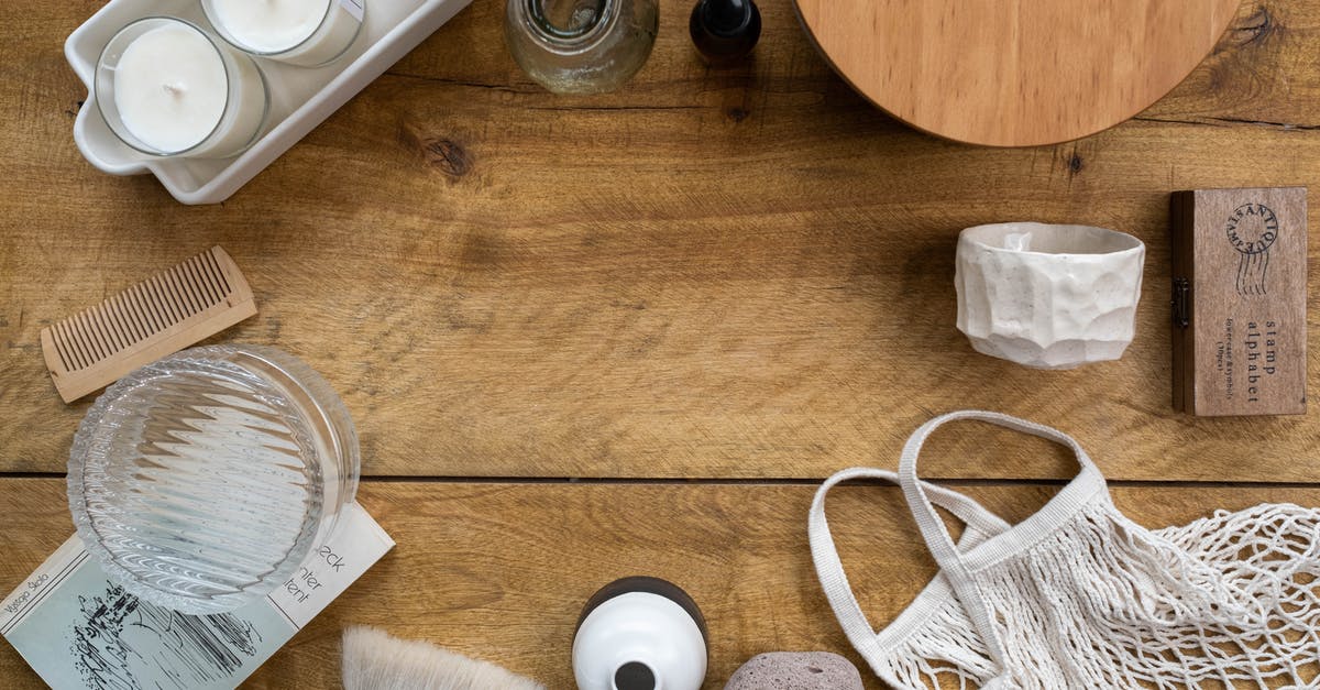 Where can I exchange Paraguayan Guaranies in Santiago, Chile? - White Electric Toothbrush on Brown Wooden Table