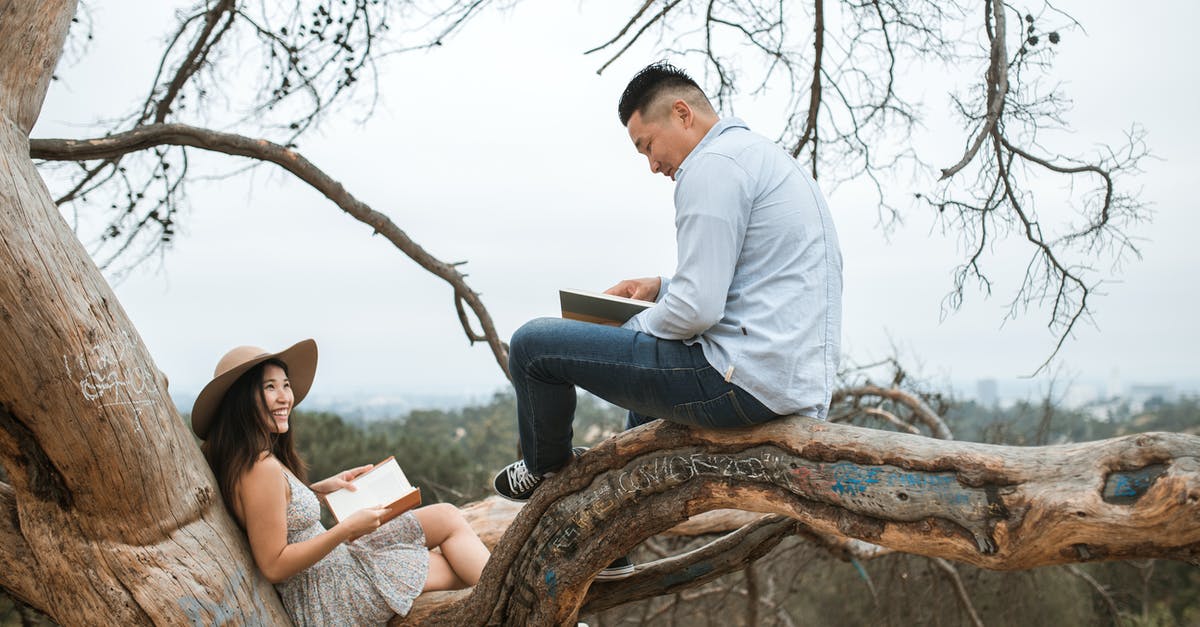 Where can I find and book plane tickets on date not on destination? - Couple Reading Books Outside