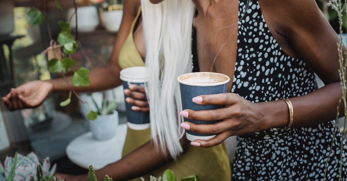 Where can I go looking for amber in Gdańsk, Poland? - Women Drinking Coffee and Looking at Plants 