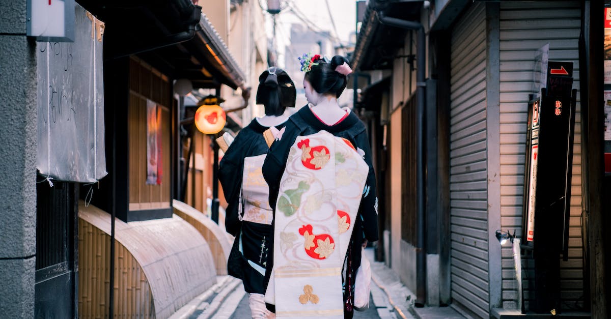 Where can I photograph fake geisha in Kyoto? - Women Walking on Alley