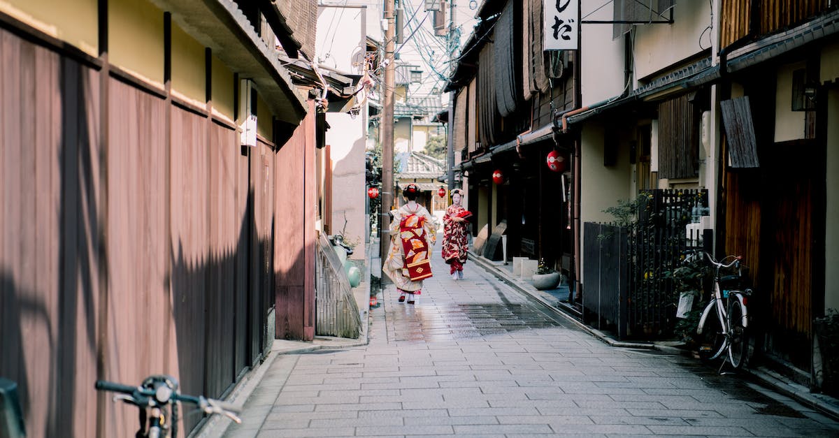 Where can I photograph fake geisha in Kyoto? - Two Women Wearing Kimono