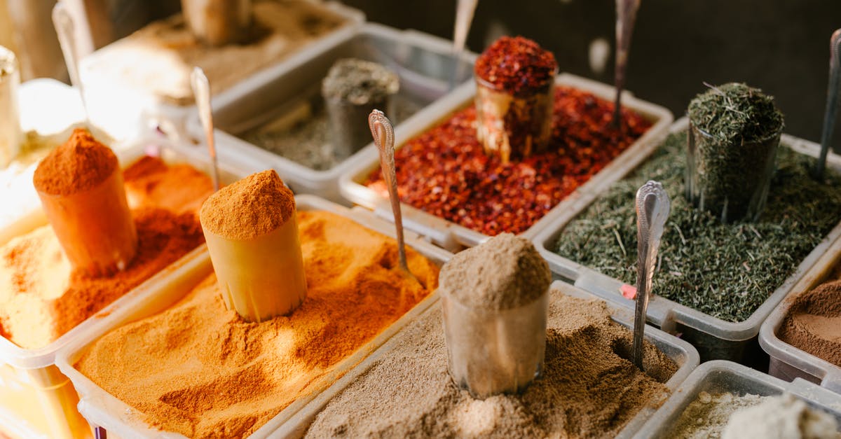 Where can I purchase good and inexpensive protein powder in Hong Kong? [closed] - Assorted spices at counter in street market