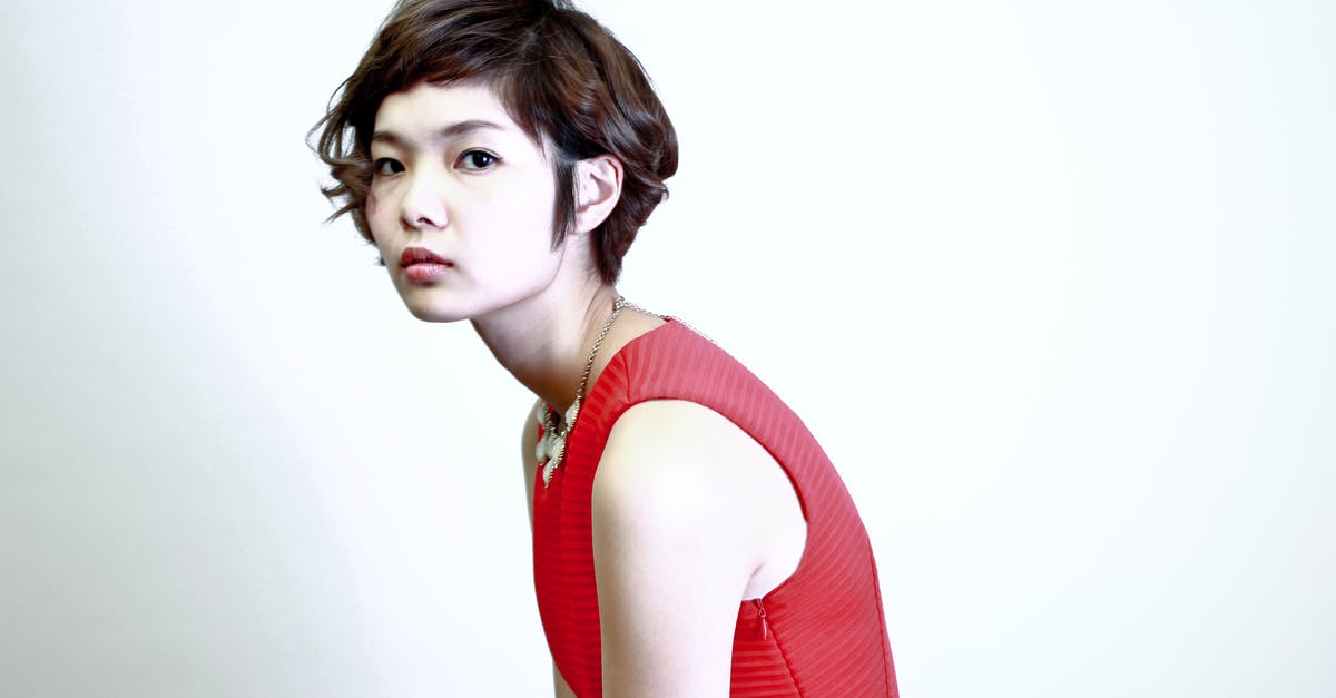 Where can I socialize with young Japanese people? - Woman Wearing Red Sleeveless Top