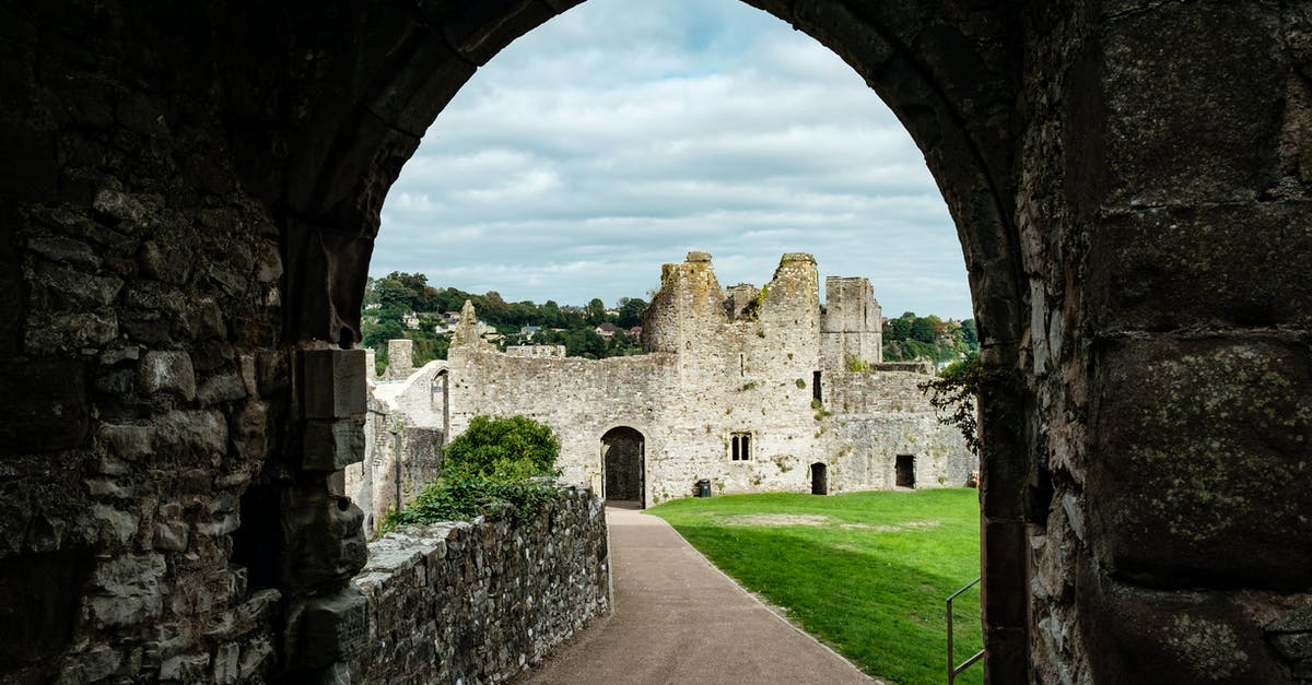 Where can I stay in a castle in northern Wales? - Road Beside a Green Field