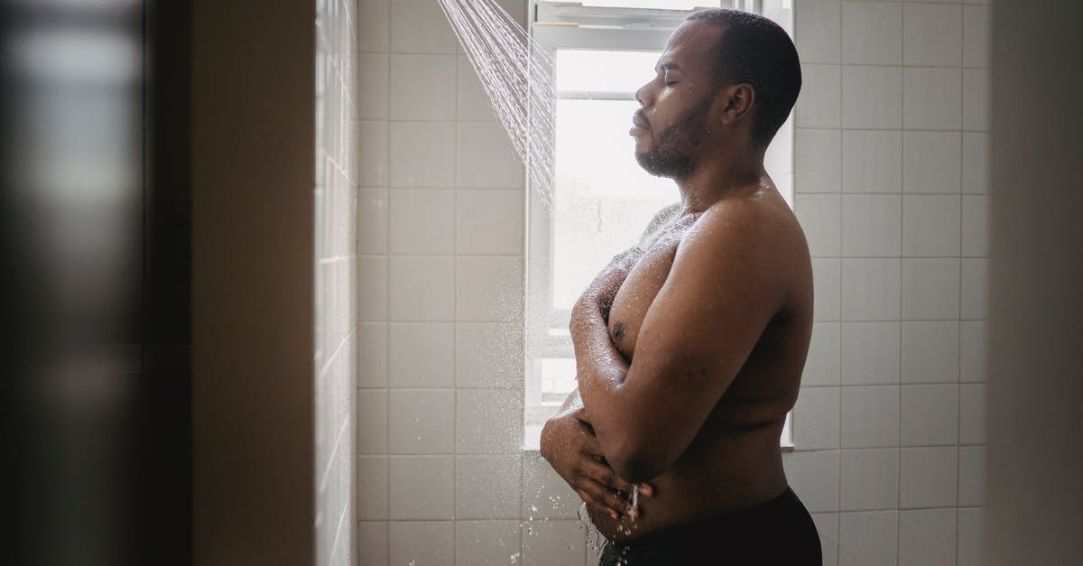 Where can I take a shower at Dubai Airport? - Man Taking a Shower 