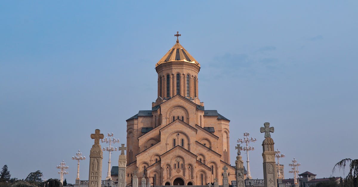 Where do I find this building in Tbilisi, Georgia? - Brown and White Concrete Church Under Blue Sky