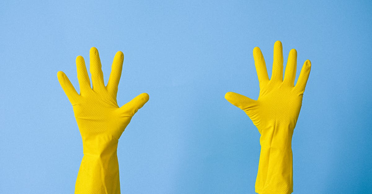 Where does the Tokaido Shinkansen stop in Tokyo? - Crop unrecognizable person in rubber gloves raising arms