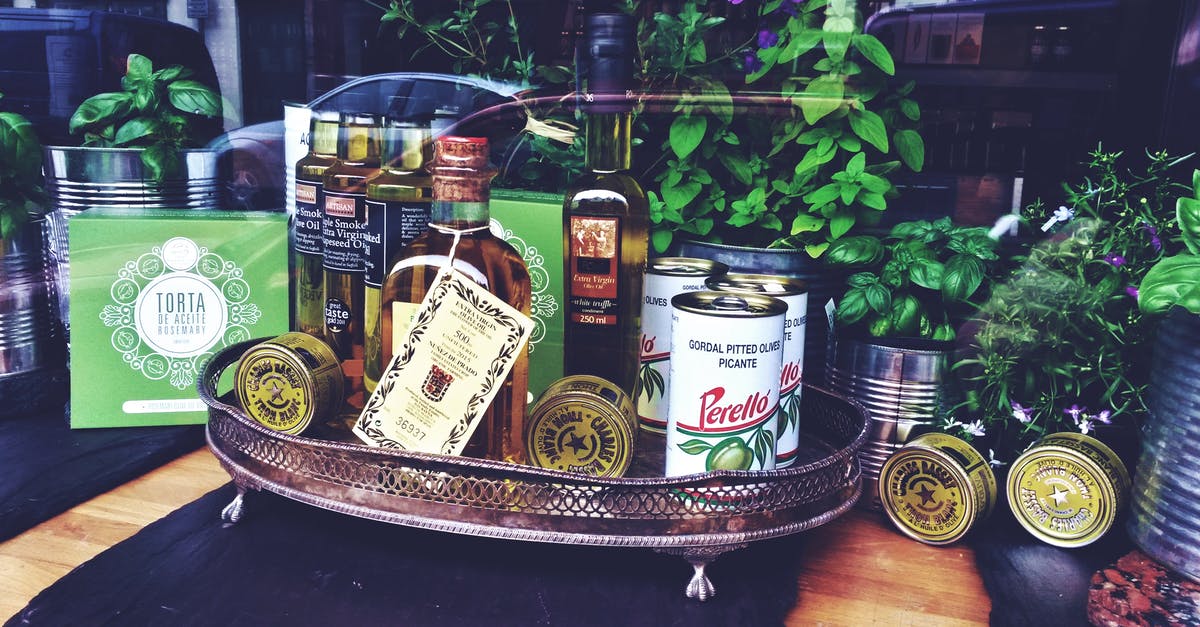 Where in Burlington, VT can I store luggage? - Photo of Bottles and Can on Tray Near Plants