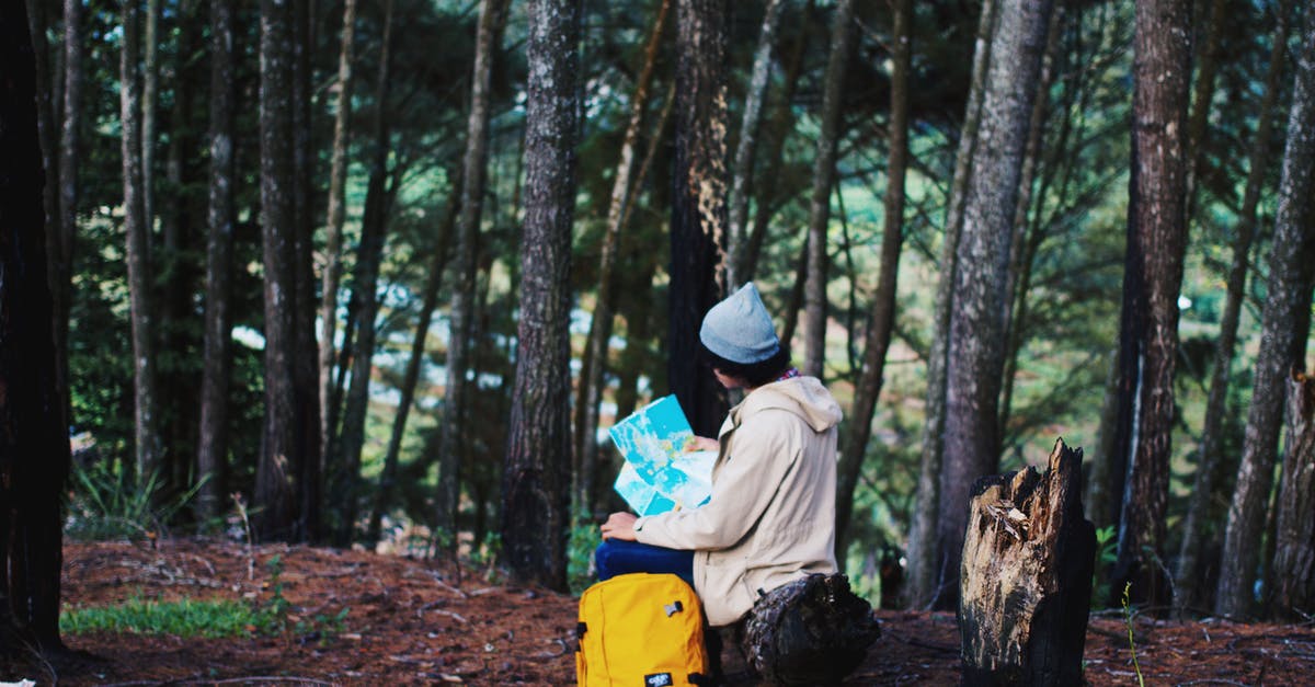 Where in Southeast Asia is free camping permitted? - Woman Wearing Blue Knit Cap