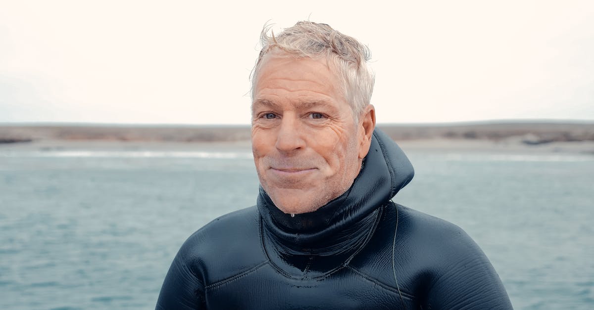 Where is the coldest commercial diving site? - Man in Black Turtle Neck Long Sleeve Shirt
