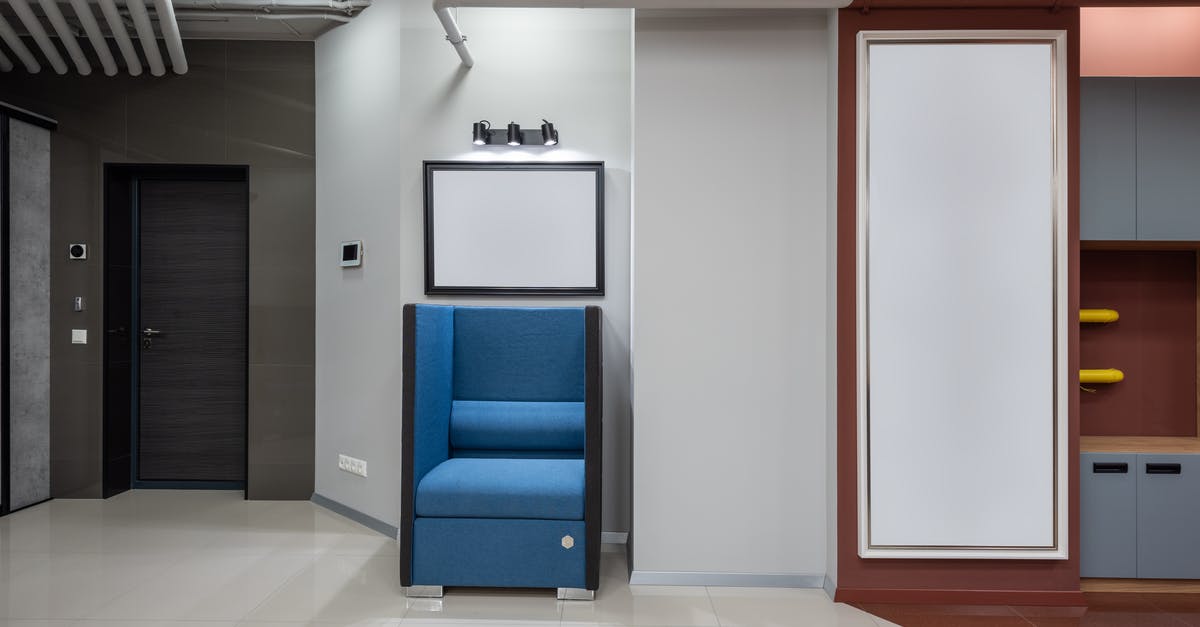 Where is this blue tile in the New York subway? - Lobby of modern office with armchair