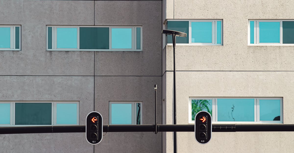 Where is this place? Windows 10 Wallpaper - Traffic Lights and Building