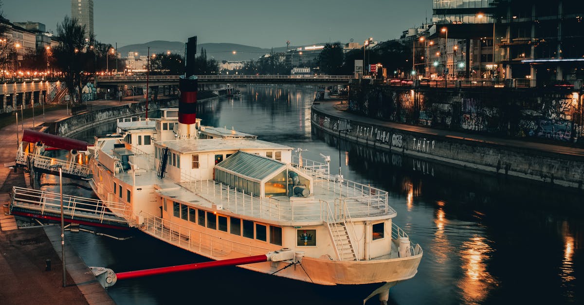 Where to buy distilled water in Vienna - White Ship Docked with Red Steel Bar