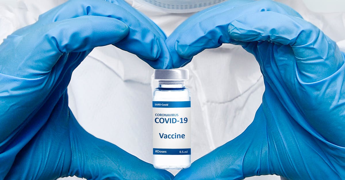 where to get an on-arrival COVID-19 PCR test in Jordan? - COVID-19 Vaccine Medical healthcare NHS technician holding make the heart	