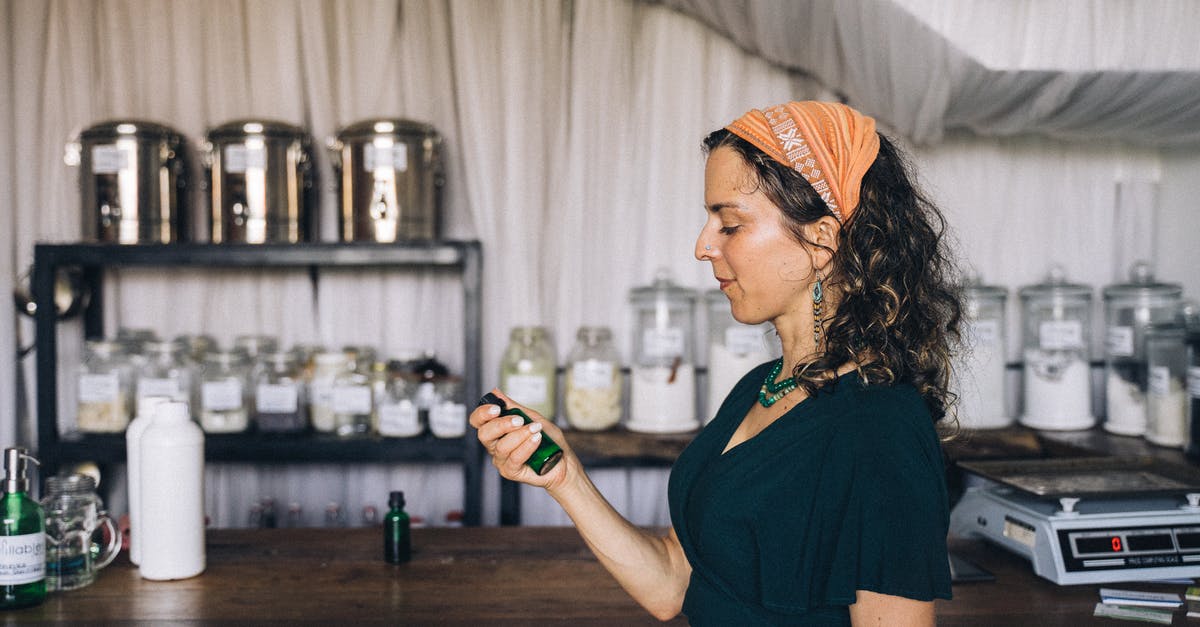 Where to refill my bottle in India? - A Woman Holding a Bottle