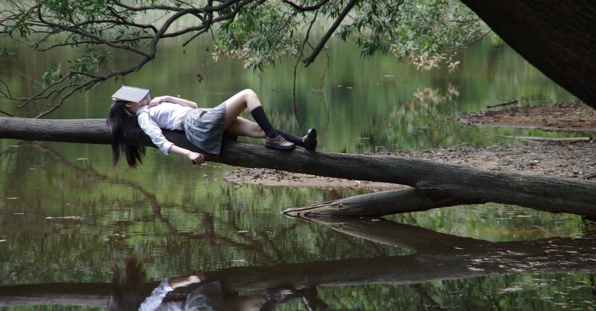 Where to sleep in the Salar of Uyuni? - Woman Lying on Tree Near Awter