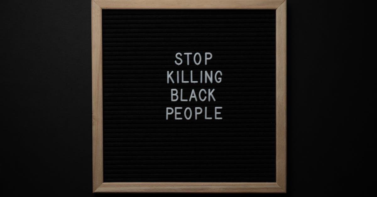 Where to stay under movement restrictions in Ireland? - Blackboard with Stop Killing Black People inscription