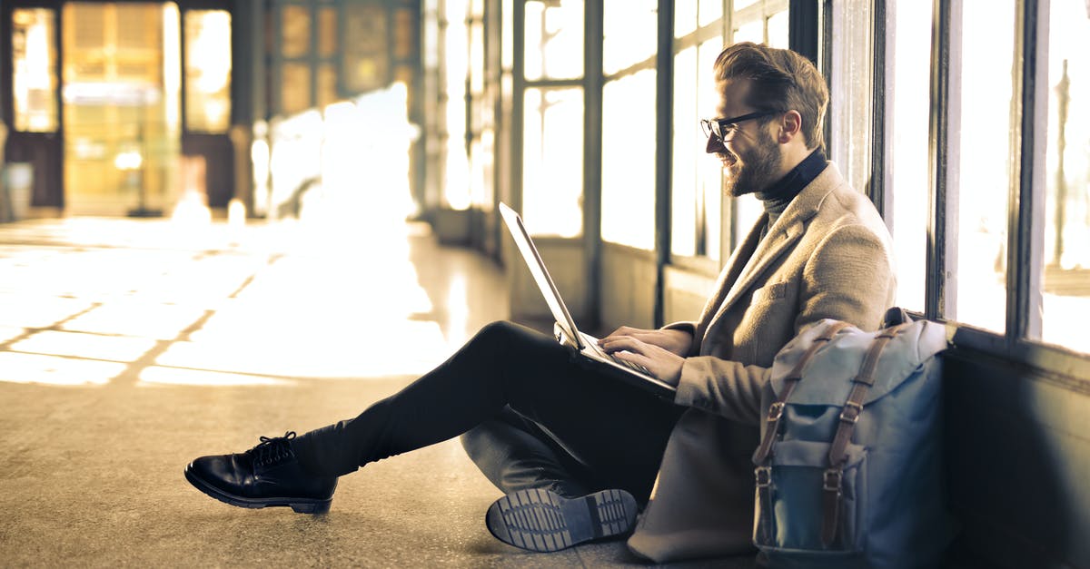 Where to store a laptop while doing few days trips during a long-term travel? - Man Wearing Gray Blazer Where to store a laptop while doing few days trips during a long-term travel? - Man Wearing Gray Blazer