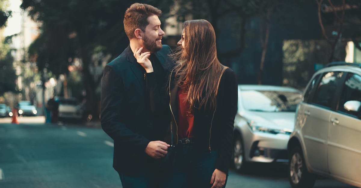 Which cities' transit cards interfere with each other? [closed] - Romantic young couple bonding on street