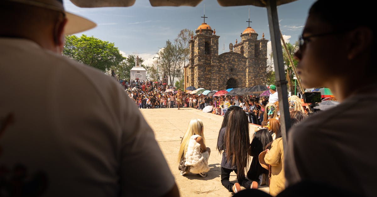 Which cities are connected by direct flights between Mexico and Asia? - People during Performance with Church in Background